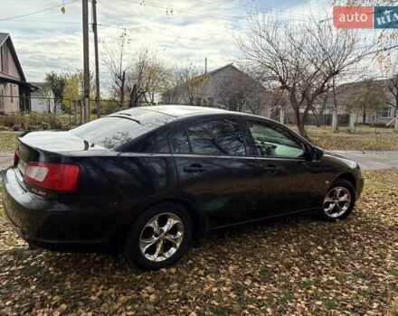 Черный Мицубиси Галант, объемом двигателя 2.4 л и пробегом 209 тыс. км за 6700 $, фото 5 на Automoto.ua