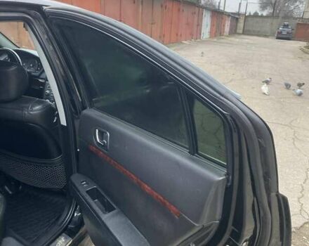 Черный Мицубиси Галант, объемом двигателя 2.38 л и пробегом 168 тыс. км за 6500 $, фото 13 на Automoto.ua