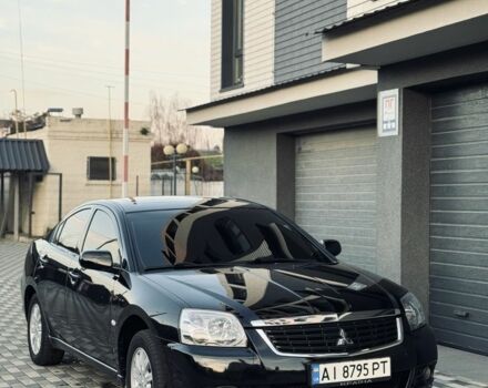Черный Мицубиси Галант, объемом двигателя 2.4 л и пробегом 139 тыс. км за 8900 $, фото 1 на Automoto.ua