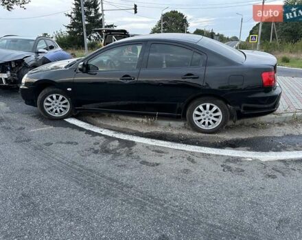 Черный Мицубиси Галант, объемом двигателя 2.4 л и пробегом 220 тыс. км за 1800 $, фото 1 на Automoto.ua