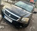 Чорний Міцубісі Галант, об'ємом двигуна 2.38 л та пробігом 195 тис. км за 4000 $, фото 1 на Automoto.ua