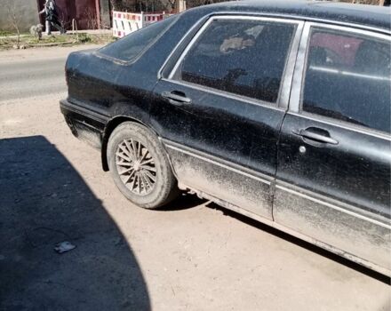 Черный Мицубиси Галант, объемом двигателя 1.8 л и пробегом 200 тыс. км за 700 $, фото 1 на Automoto.ua