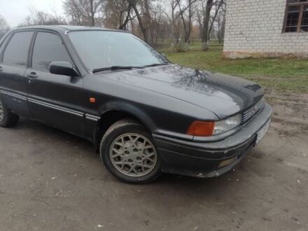 Черный Мицубиси Галант, объемом двигателя 1.8 л и пробегом 441 тыс. км за 1600 $, фото 1 на Automoto.ua