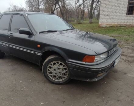 Черный Мицубиси Галант, объемом двигателя 1.8 л и пробегом 441 тыс. км за 1600 $, фото 1 на Automoto.ua