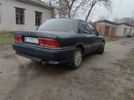 Черный Мицубиси Галант, объемом двигателя 1.8 л и пробегом 441 тыс. км за 1600 $, фото 1 на Automoto.ua