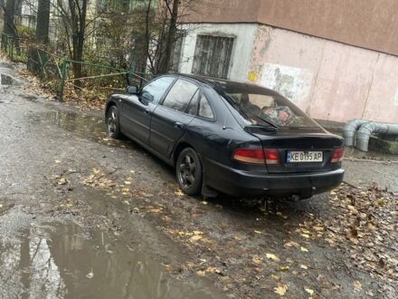 Черный Мицубиси Галант, объемом двигателя 2 л и пробегом 349 тыс. км за 1500 $, фото 1 на Automoto.ua