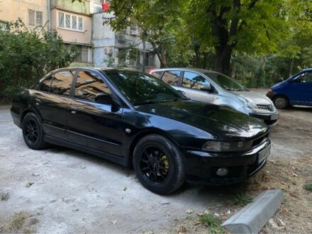 Черный Мицубиси Галант, объемом двигателя 2.5 л и пробегом 360 тыс. км за 3500 $, фото 1 на Automoto.ua