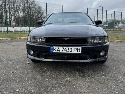 Черный Мицубиси Галант, объемом двигателя 2 л и пробегом 164 тыс. км за 5000 $, фото 1 на Automoto.ua