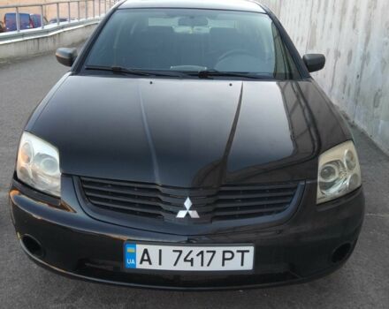 Черный Мицубиси Галант, объемом двигателя 2.4 л и пробегом 460 тыс. км за 3650 $, фото 1 на Automoto.ua