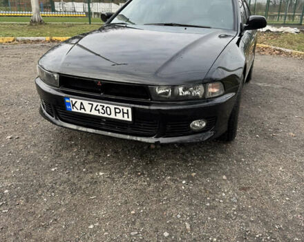 Черный Мицубиси Галант, объемом двигателя 2 л и пробегом 164 тыс. км за 5000 $, фото 1 на Automoto.ua