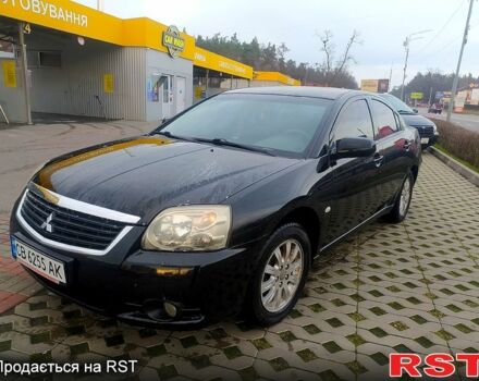Черный Мицубиси Галант, объемом двигателя 2.4 л и пробегом 260 тыс. км за 6000 $, фото 1 на Automoto.ua