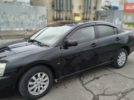 Черный Мицубиси Галант, объемом двигателя 2.38 л и пробегом 330 тыс. км за 5000 $, фото 1 на Automoto.ua