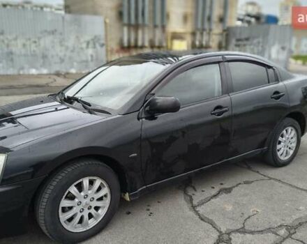 Черный Мицубиси Галант, объемом двигателя 2.38 л и пробегом 330 тыс. км за 5000 $, фото 1 на Automoto.ua