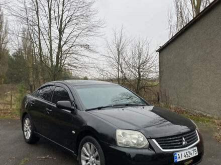 Черный Мицубиси Галант, объемом двигателя 2.4 л и пробегом 341 тыс. км за 5500 $, фото 1 на Automoto.ua