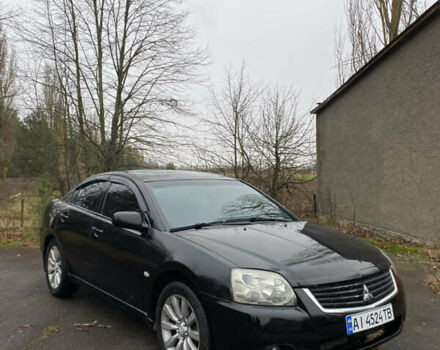 Черный Мицубиси Галант, объемом двигателя 2.4 л и пробегом 341 тыс. км за 5500 $, фото 1 на Automoto.ua