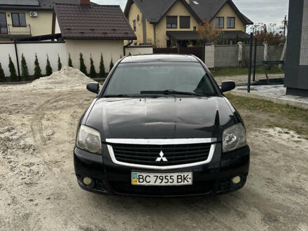 Черный Мицубиси Галант, объемом двигателя 2.38 л и пробегом 560 тыс. км за 3300 $, фото 1 на Automoto.ua