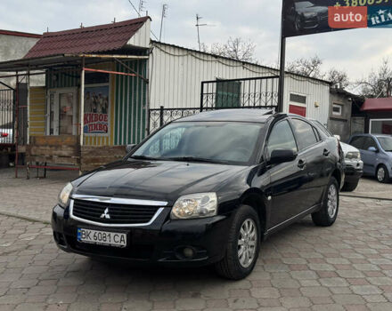 Черный Мицубиси Галант, объемом двигателя 2.38 л и пробегом 350 тыс. км за 5499 $, фото 1 на Automoto.ua