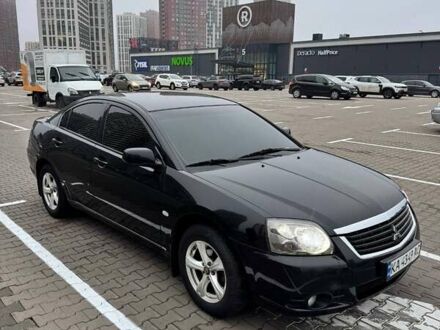 Черный Мицубиси Галант, объемом двигателя 2.38 л и пробегом 191 тыс. км за 6500 $, фото 1 на Automoto.ua