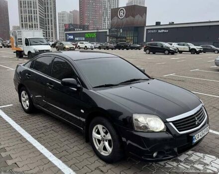 Черный Мицубиси Галант, объемом двигателя 2.38 л и пробегом 191 тыс. км за 6500 $, фото 1 на Automoto.ua