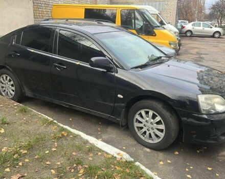 Черный Мицубиси Галант, объемом двигателя 2.4 л и пробегом 450 тыс. км за 4500 $, фото 1 на Automoto.ua