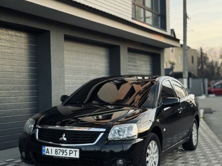 Черный Мицубиси Галант, объемом двигателя 2.4 л и пробегом 139 тыс. км за 8900 $, фото 1 на Automoto.ua