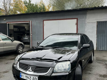 Черный Мицубиси Галант, объемом двигателя 2.4 л и пробегом 230 тыс. км за 6300 $, фото 1 на Automoto.ua