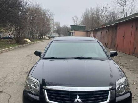 Черный Мицубиси Галант, объемом двигателя 2.38 л и пробегом 168 тыс. км за 6500 $, фото 1 на Automoto.ua