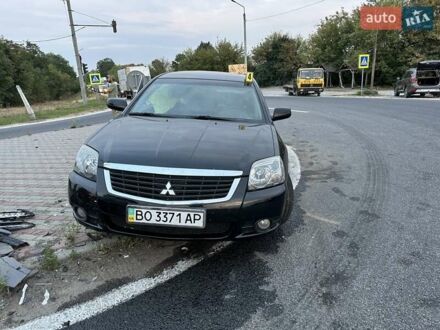 Черный Мицубиси Галант, объемом двигателя 2.4 л и пробегом 220 тыс. км за 1800 $, фото 1 на Automoto.ua