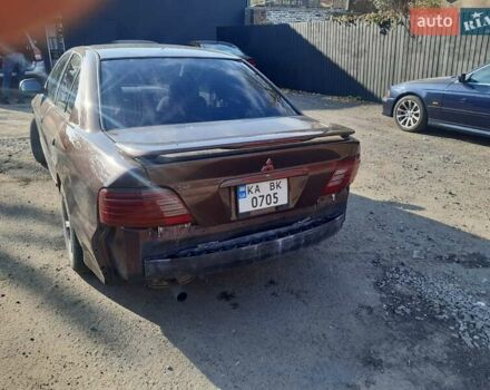 Коричневый Мицубиси Галант, объемом двигателя 2.4 л и пробегом 300 тыс. км за 3000 $, фото 2 на Automoto.ua