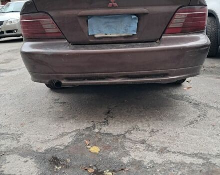 Коричневый Мицубиси Галант, объемом двигателя 2.4 л и пробегом 180 тыс. км за 3200 $, фото 1 на Automoto.ua