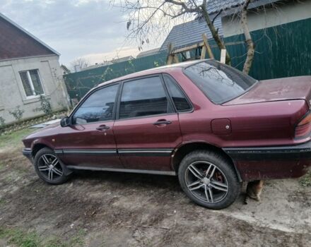 Червоний Міцубісі Галант, об'ємом двигуна 2 л та пробігом 327 тис. км за 1000 $, фото 1 на Automoto.ua