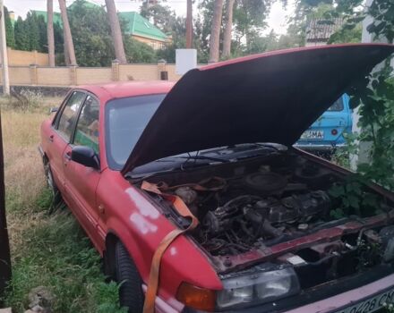 Червоний Міцубісі Галант, об'ємом двигуна 2 л та пробігом 150 тис. км за 832 $, фото 1 на Automoto.ua