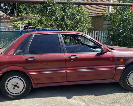 Красный Мицубиси Галант, объемом двигателя 2 л и пробегом 341 тыс. км за 1500 $, фото 2 на Automoto.ua