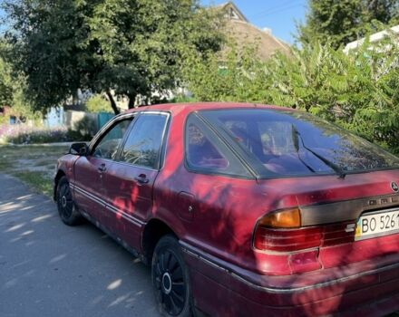 Красный Мицубиси Галант, объемом двигателя 1.6 л и пробегом 370 тыс. км за 500 $, фото 1 на Automoto.ua