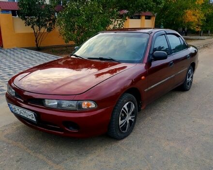 Красный Мицубиси Галант, объемом двигателя 1.8 л и пробегом 300 тыс. км за 1800 $, фото 1 на Automoto.ua