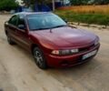 Красный Мицубиси Галант, объемом двигателя 1.8 л и пробегом 300 тыс. км за 1800 $, фото 1 на Automoto.ua
