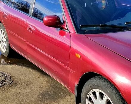 Красный Мицубиси Галант, объемом двигателя 2 л и пробегом 297 тыс. км за 2900 $, фото 2 на Automoto.ua