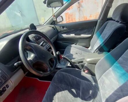 Красный Мицубиси Галант, объемом двигателя 2.5 л и пробегом 250 тыс. км за 5000 $, фото 4 на Automoto.ua