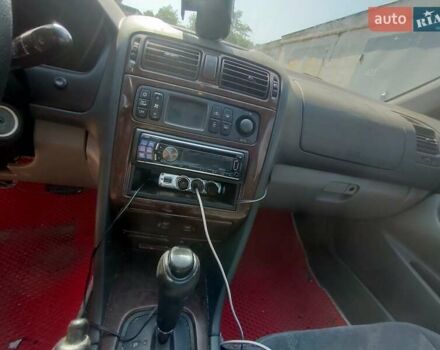 Красный Мицубиси Галант, объемом двигателя 2.5 л и пробегом 250 тыс. км за 5000 $, фото 6 на Automoto.ua