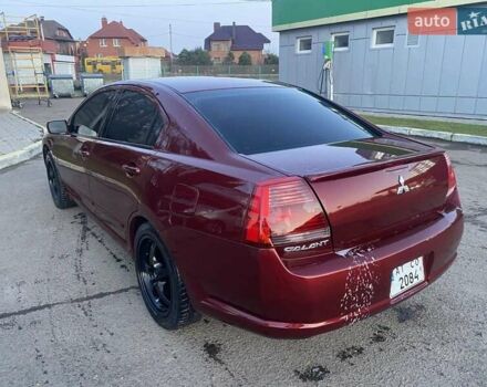 Красный Мицубиси Галант, объемом двигателя 2.4 л и пробегом 236 тыс. км за 4000 $, фото 4 на Automoto.ua