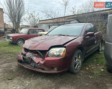 Красный Мицубиси Галант, объемом двигателя 2.35 л и пробегом 300 тыс. км за 2650 $, фото 1 на Automoto.ua