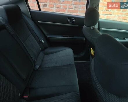 Червоний Міцубісі Галант, об'ємом двигуна 2.38 л та пробігом 235 тис. км за 4444 $, фото 7 на Automoto.ua