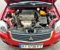 Червоний Міцубісі Галант, об'ємом двигуна 2.4 л та пробігом 300 тис. км за 5800 $, фото 1 на Automoto.ua