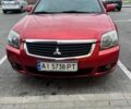 Красный Мицубиси Галант, объемом двигателя 2.38 л и пробегом 300 тыс. км за 6200 $, фото 1 на Automoto.ua