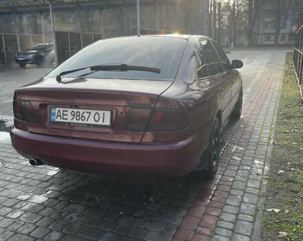 Красный Мицубиси Галант, объемом двигателя 1.8 л и пробегом 300 тыс. км за 2500 $, фото 4 на Automoto.ua