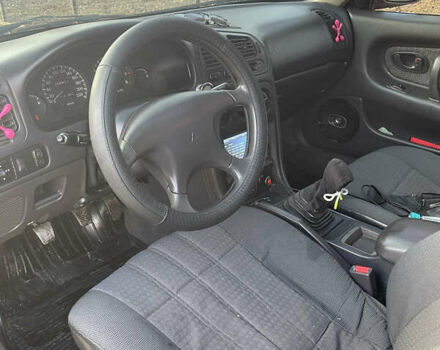 Красный Мицубиси Галант, объемом двигателя 1.8 л и пробегом 300 тыс. км за 2500 $, фото 5 на Automoto.ua