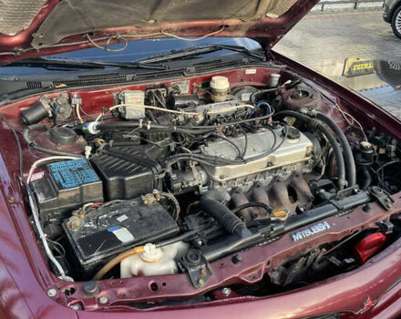 Красный Мицубиси Галант, объемом двигателя 1.8 л и пробегом 300 тыс. км за 2500 $, фото 1 на Automoto.ua