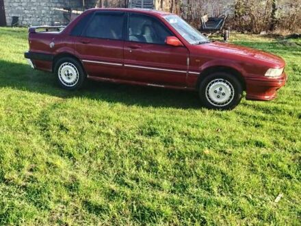 Червоний Міцубісі Галант, об'ємом двигуна 2 л та пробігом 300 тис. км за 850 $, фото 1 на Automoto.ua