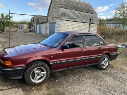 Мицубиси Галант 1989 в Подольск (Котовск) на Automoto.ua Красный Мицубиси Галант, объемом двигателя 2 л и пробегом 280 тыс. км за 1700 $, фото 1 на Automoto.ua
