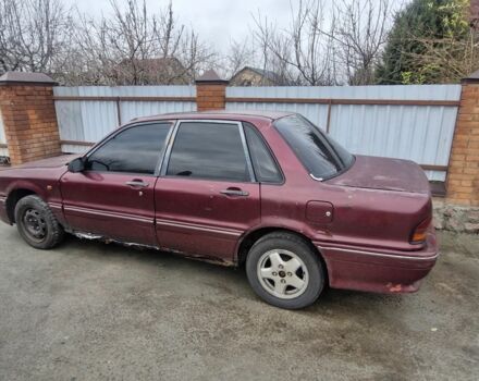 Красный Мицубиси Галант, объемом двигателя 1.8 л и пробегом 324 тыс. км за 350 $, фото 1 на Automoto.ua